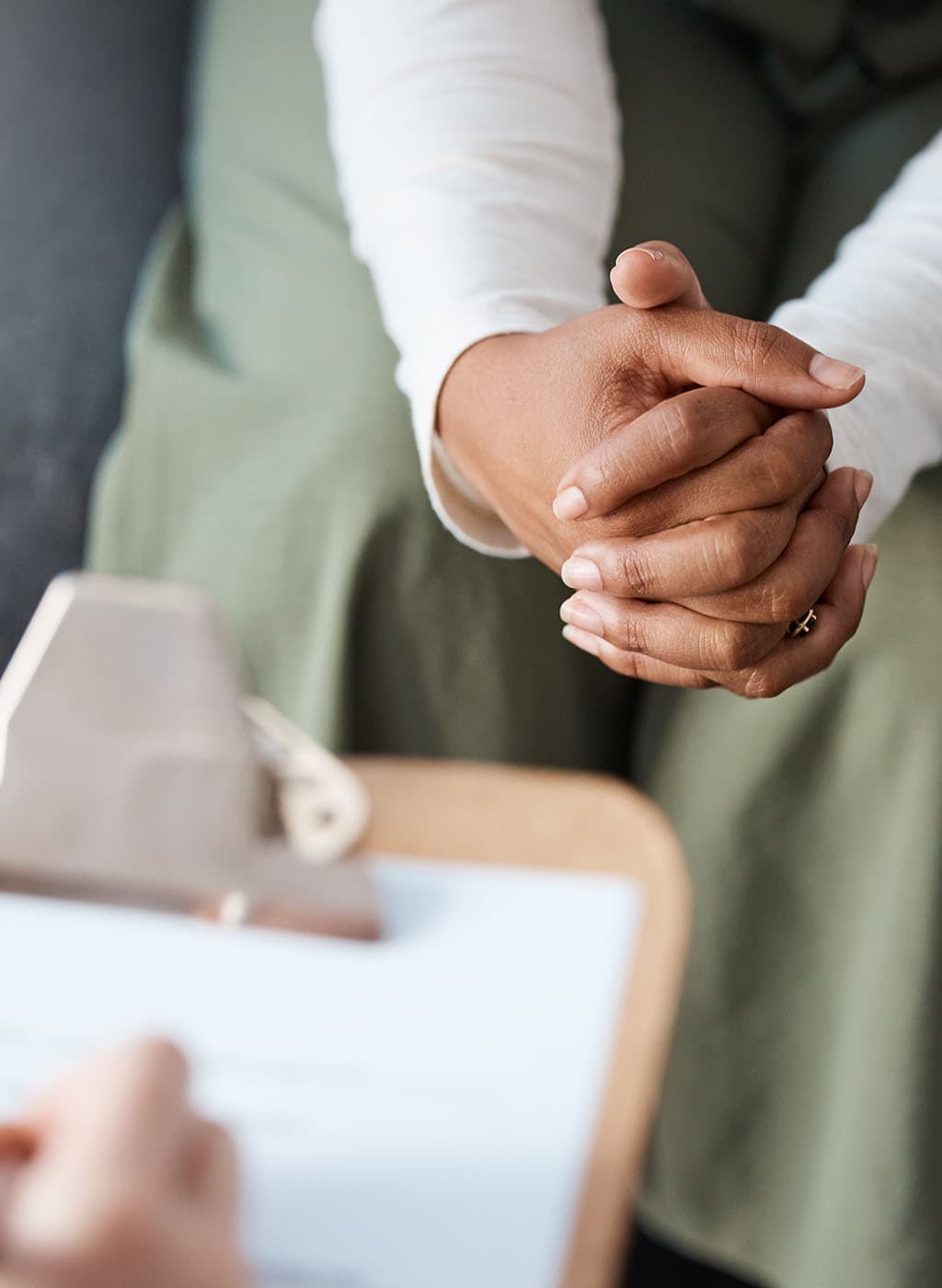 adhd Caring hands of a therapist offering support at Creve Coeur Behavioral Counseling, focusing on mental health, therapy, and emotional well-being services.