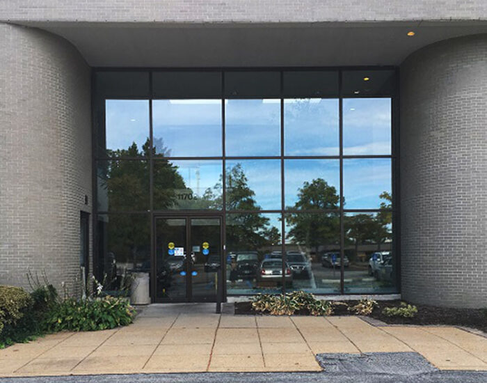 Brick exterior and glass entryway of Creve Coeur Counseling office building.