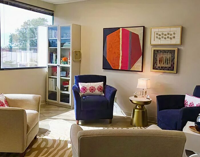 Comfortable therapy office at Creve Coeur Behavioral Counseling with cozy chairs, calming decor, and bright natural light for a welcoming mental health environment.